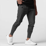Space grey high rib jogger worn with white sneakers, side view