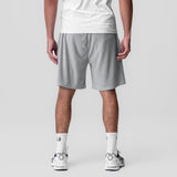 Towel Terry Relaxed Short in Heather Grey, back view on model