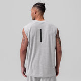 Heather grey towel terry cutoff tank top on male model, back view