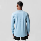 AeroSilver Training Long Sleeve in light sky, worn by model, back view