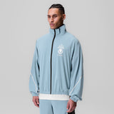 Aerotex Track Jacket in light sky blue worn by male model, front view