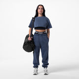 Tech Essential Relaxed Tee in Faded Navy, model wearing cropped tee with matching joggers
