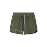 flatlay Tetra-Lite 5" Linerless Short in olive with reflective branding, front view