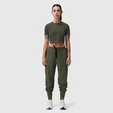 Olive cropped tee paired with olive cargo joggers, front view on model
