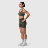 W029 Lycra 3-in-1 Biker Short in olive, worn by model in side profile stance