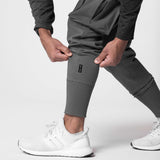 Tech-Terry Cargo High Rib Jogger in Space Grey, worn by model with white sneakers