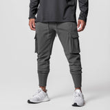 Tech-Terry Cargo High Rib Jogger in Space Grey, worn by model with white sneakers