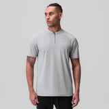 Tetra-Lite® Ice Zip Tee in slate grey worn by male model, front view