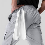 Tetra-Lite Ice Cargo jogger in slate grey worn by model, side view showing cargo pocket detail
