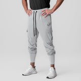 Tetra-Lite Ice Cargo High Rib Jogger in slate grey, worn by model standing front view