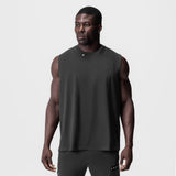 Tech Essential Relaxed Cutoff sleeveless tank in space grey, worn by model, front view