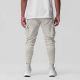 Tech-Terry Cargo High Rib Jogger in stone, worn by model, back view