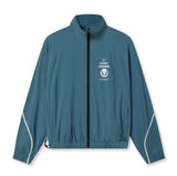 flatlay Aerotex Track Jacket in storm blue, front view