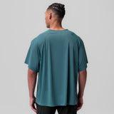 Ice-Skin Oversized Tee in storm blue, back view on model