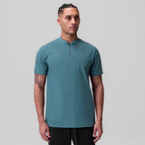 Tetra-Lite Ice Zip Tee in storm blue, worn by model, front view