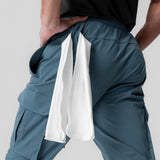 Tetra-Lite Ice Cargo jogger in storm blue, worn by model showing back pocket detail