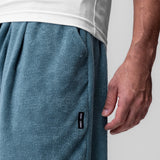Towel Terry Relaxed Short in storm blue, worn by model showing side detail and fit