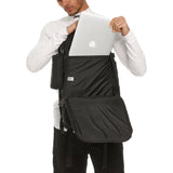 0275 Modular Everyday Pack in black, worn by model demonstrating laptop compartment