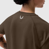 AeroSilver® Cropped Tee in Dark Earth, back view on model