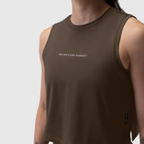 AeroSilver Tank Top in Dark Earth worn by model, front view with 'Relentless Pursuit' text