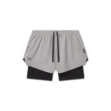 flatlay Tetra-Lite Liner Short in slate grey with black inner shorts, top view