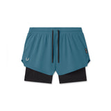 Flatlay of Tetra-Lite Liner Short in storm blue and black, front view
