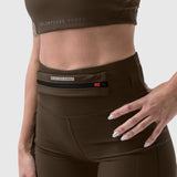 LYCRA® 3-in-1 Biker Short in Dark Earth worn on model, waist detail view