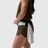 Tetra-Lite Linerless Short in dark earth, worn with white towel around waist, side view