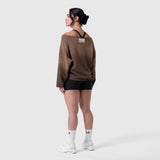 Raw Hem Oversized Crewneck in dark earth, worn with black shorts and white socks, back view