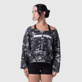 Raw Hem Oversized Crewneck in pixel camo worn by model, front view