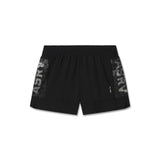 Flatlay of black Tetra-Lite Adventure Short with gray side panels, front view