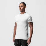 AeroSilver® Fitted Tee in white, worn by male model in side profile view