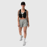 1080 Run Pack in Black, front view worn by model