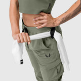 Tetra-Lite Cargo High Rib Jogger in sage, worn by model showing waistband and cargo pocket detail