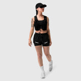 W025 Tetra-Lite Liner Short in black, modeled with matching vest and cap