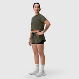 W025 Tetra-Lite Liner Short in olive, worn with cropped tee, front side view