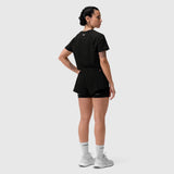 AeroSilver Cropped Tee in black, worn by model in back view with matching shorts