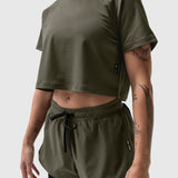 AeroSilver Cropped Tee in olive worn by model showing front view and midriff