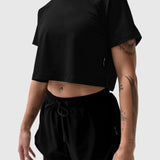 Black AeroSilver® Cropped Tee worn by model, front view showing midriff