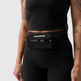 W030 Lycra 3-in-1 Legging in black with waistbelt, worn by model