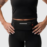 W030 LYCRA 3-in-1 Legging in black worn with waist belt, front view