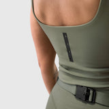 Sage LYCRA® 2-in-1 tank top on model, side view with belt detail