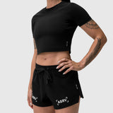 W037 Tetra-Lite Linerless Short in black with bracket logo, worn by model