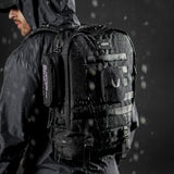 0275 Modular Everyday Pack in black, worn by model in rain