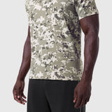 Digital camo Supima® Essential Tee worn with black shorts, side view on model