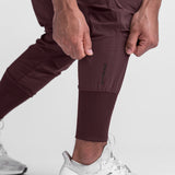 Tetra-Lite® Cargo High Rib Jogger in Faded Plum worn by model, detail view of calf cuff