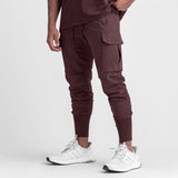 Tetra-Lite® Cargo High Rib Jogger in faded plum, modeled with white sneakers, front view