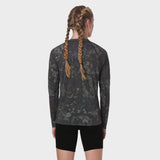 Polartec® Delta Longsleeve in pixel camo, back view on model with braided hair