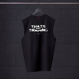 Black sleeveless cutoff tank with 'THAT'S ASRV TRAINING' graphic, hung on hanger against brick wall
