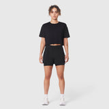 W082 Supima Ice-Skin Reversible Crop Tee in black, worn with matching shorts, front view